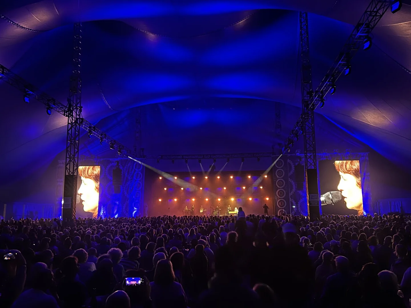 Main stage lighting and LED screens at a regional Victoria music festival